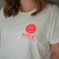 T-Shirt "SMILE Jesus loves you" weiß / Neon rot